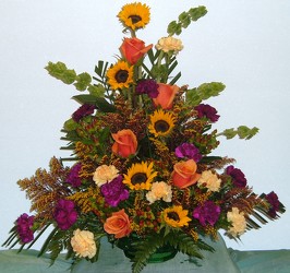 Traditional Funeral Arrangement in Fall Colors from Beck's Flower Shop & Gardens, in Jackson, Michigan