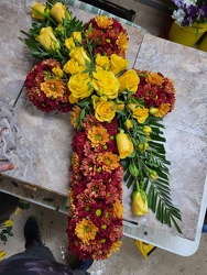 Cross tribute from Beck's Flower Shop & Gardens, in Jackson, Michigan